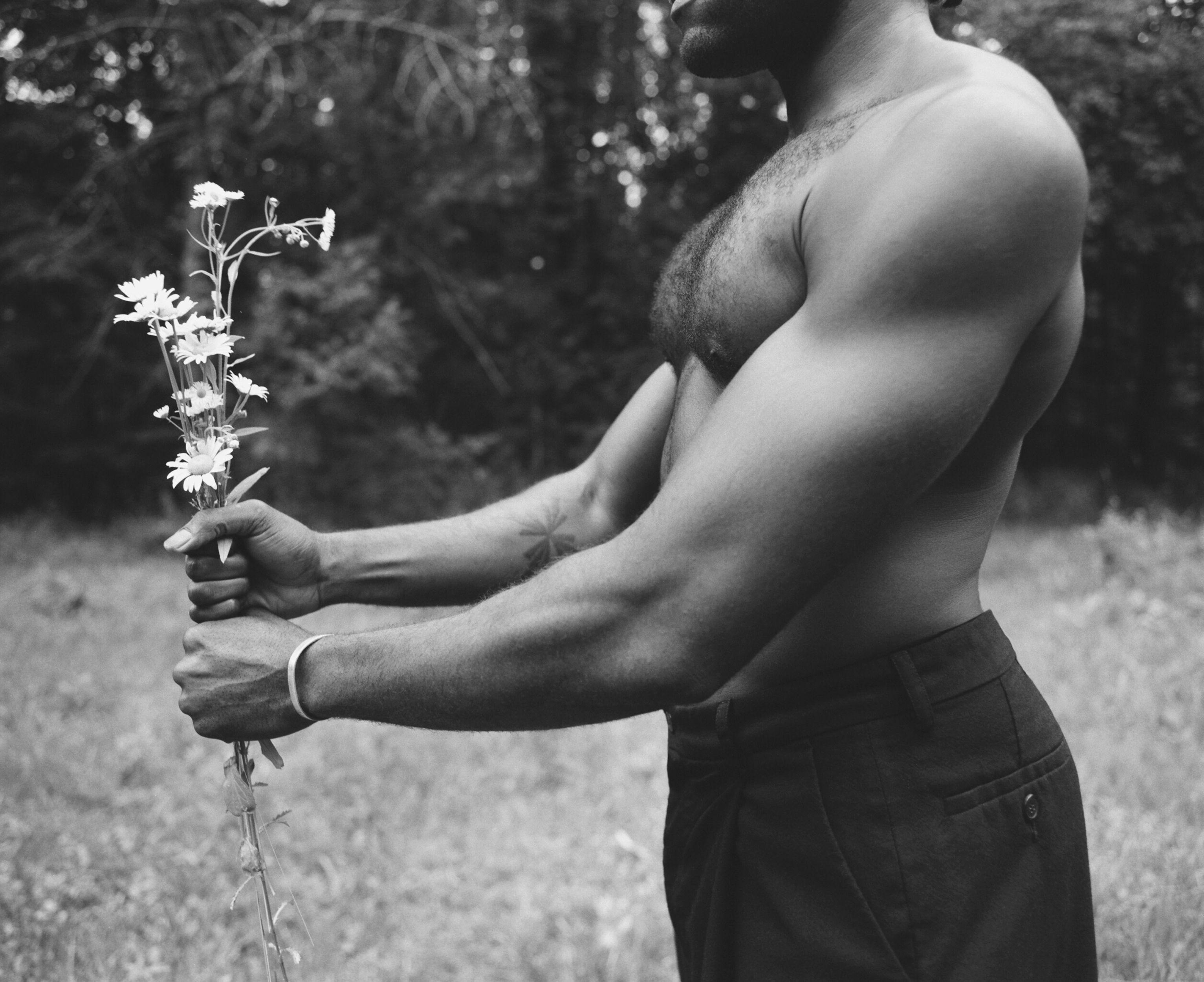 holding flowers